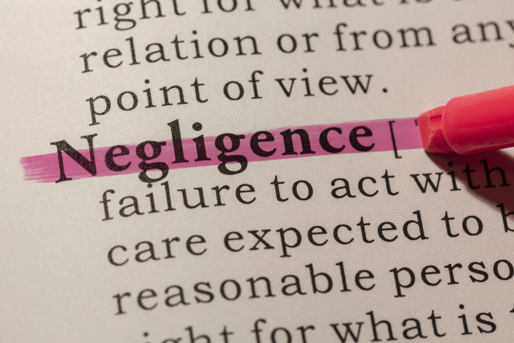 Sheet of paper with highlighting the word Negligence 